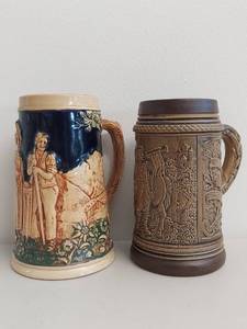 lot 20C image: Pair of Vintage German Ceramic Beer Steins with Relief Design