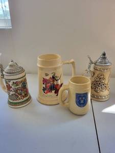 lot 58C image: Set of 4 Vintage Ceramic Beer Steins with Collectible Artwork including Milk Glass
