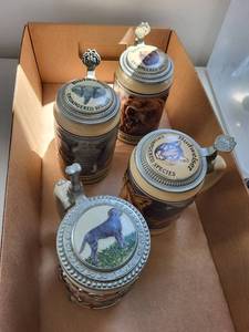 lot 65C image: Collection of 4 Budweiser Endangered Species Wildlife Steins