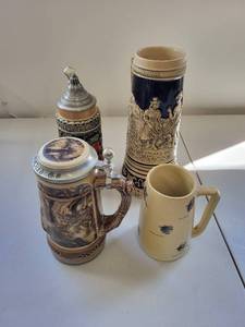 lot 73C image: Set of 4 Collectible Ceramic Steins with Diverse Designs