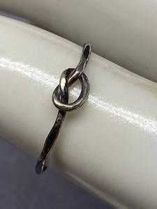 lot 66B image: Sterling Silver 925 Knot Ring Size 7.5