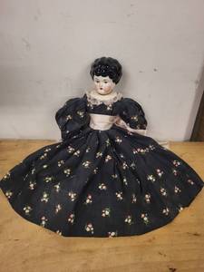 lot 10A image: Vintage Porcelain Doll with Floral Dress and Lace Detailing