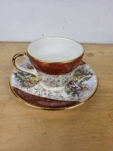 lot 17A image: Vintage Royal China Teacup and Saucer with 22 Kt Gold Trim