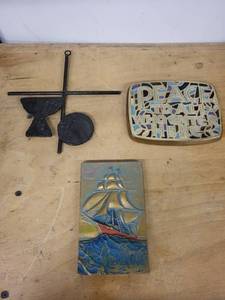 lot 46S image: Collection of 3 Vintage Wall Plaques - Brutalist Cross and Sacraments, Terra Santa 1966 Peace to all that enter here, and AE Michell Art Co Launch Out Ship