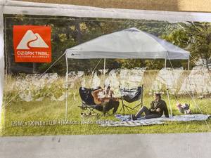 lot 105 image: Ozark Trail 10x10 Instant Pop Up Canopy Tent