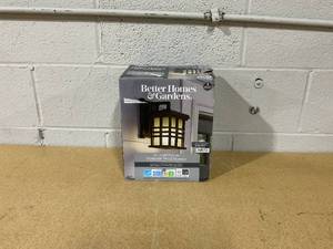 lot 303 image: Better Homes & Gardens 9.8 Farmhouse Bronze Outdoor Wall Light, Metal Fixture Stained Glass Shade