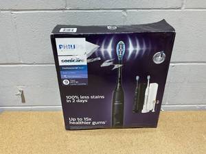 lot 40 image: Philips Sonicare Professional Clean Rechargeable Electric Toothbrush