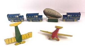 lot 9 image: 1930s Cracker Jack Tin Police Patrol, Blimp and Airplane Toys