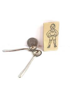 lot 8 image: Antique Cracker Jack Tracing Toy and Two German Salt Spoons