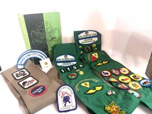 lot 19 image: 1957 Girl Scout Handbook and Vintage Sashes and Patches