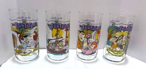 lot 89 image: 4 Hardees The First 30 Years The Flintstones Glasses 1991