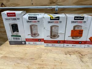 lot 102 image: Kwikset smart code electronic lever lot of 8