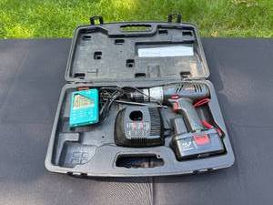 lot 7 image: Craftsman 19.2V Cordless Drill with Charger and Drill Bit Set (incomplete)
