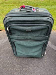 lot 63 image: Green Rolling Suitcase with Handle