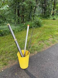 lot 64 image: Collection of Fishing Rods and Accessories in Yellow Bucket