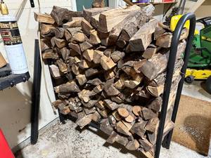 lot 72 image: Stack of Firewood Logs on Metal Rack