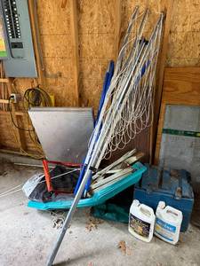 lot 77 image: Garage Lot with Sled, Nets, Metal Panels and Industrial Cleaner - quantity contents unverified