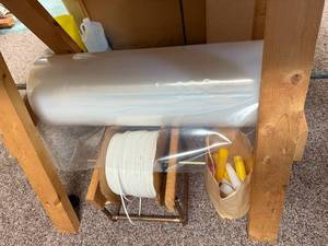 lot 91 image: Large Roll of Plastic Sheeting with Cotten Rope and Accessories