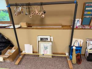 lot 120 image: Adjustable 67 H x 62 W Clothing Rack with Hangers - pictures NOT included