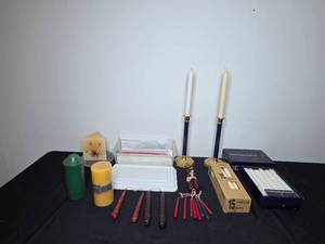 lot 153 image: Assorted Candle Collection Including Tapers, Pillars, and Decorative Designs