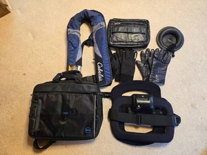 lot 264 image: Cabelas Personal Flotation Device and Assorted Outdoor Gear Set Inc Leather Gloves