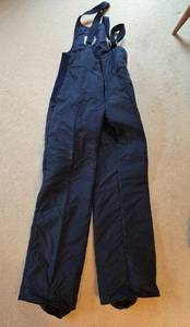 lot 276 image: Snow Trails Childrens Size 16 Snow Bibs and Foxelli XL Heated Vest