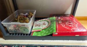 lot 294 image: Christmas Holiday Decoration Set with Plates, Napkins, Tablecloth, and Ribbon