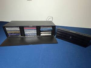 lot 366 image: Laserline CD Cabinet with Assorted CDs and Soundfreaq Speaker