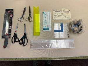 lot 380 image: Sewing and Measuring Tool Assortment with Scissors and Templates