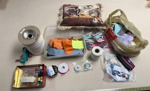 lot 383 image: Assorted Sewing Supplies with Fabric Scraps, Threads, and Ribbons