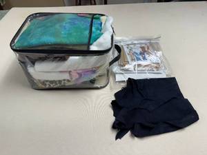 lot 400 image: Assorted Vintage Sewing Patterns and Fabrics Collection