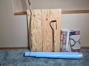 lot 434 image: Assorted Home Improvement Items with Rugs, Walking Stick, Cane, and Wood Panels