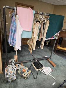 lot 447 image: Clothing and Accessories Storage Rack with Assortment of Fabric and Bags