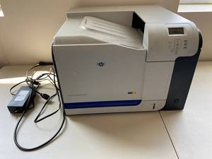 lot 11E image: HP Color LaserJet CP3525n Printer