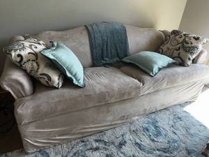 lot 11L image: Elegant Beige Sofa with Decorative Cushions