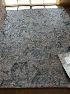 lot 27L image: Calvin Klein 8 x 10 Area Rug with Blue Swirl Design