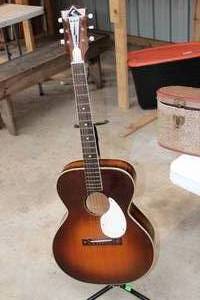 lot 14 image: Vintage Acoustic Guitar and Stand