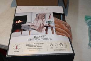 lot 36 image: Heated Sjerpa Throw