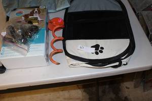 lot 83 image: Dog items, leash holder, blanket Food Container etc