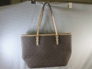 lot 140 image: (D-3) Michael Kors Jet Set Traveler...