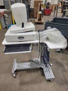 lot 9 image: Optovue RTVUE PREMIER (565209) With SitStand Desk, RTVUE Broken, See Description