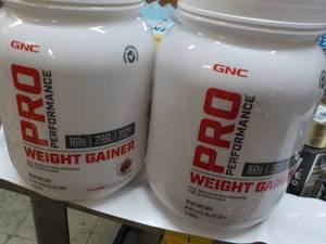 lot 33 image: 2 GNC Pro Performance Weight Gainer...