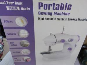 lot 207 image: Portable Sewing Mini Electric Machi...