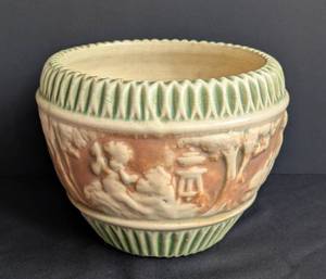lot 49 image: Roseville Donatello Cherub Pottery Jardiniere