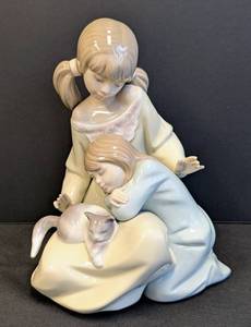 lot 47 image: Lladro Little Sister Porcelain Figurine