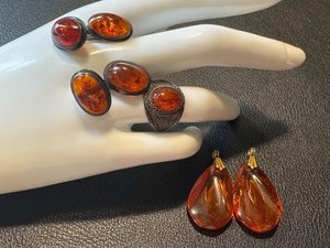 lot 45G image: Silver and Amber Vine Cufflinks, Resin Amber-like Pendants, and Vintage Amber Ring