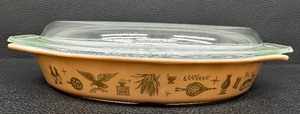 lot 123 image: Pyrex Early American Pattern Divided Casserole with Lid