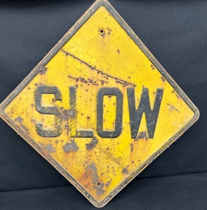 lot 144 image: Retired Rustic SLOW Metal Street Sign