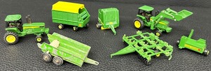 lot 157 image: John Deere Farming Equipment Toy Cars with Bonus 1970 Tootsie Toy Seed Spreader