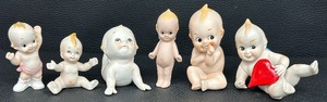 lot 95A image: A Cute Collection of Ceramic Kewpie Dolls - Lot of Six